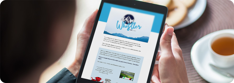 man looking at awards catalog on ipad